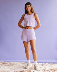 Woman wearing Movement CloudFLX 3" Short - Orchid Bloom Marl | Model:Beatriz | Size:XS