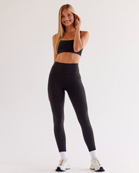 Woman wearing O.G Fusion Ultra High-Rise Full Length Legging Pockets - Black | Model:Taneisha | Size:XS