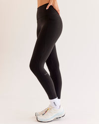 Woman wearing O.G Fusion Ultra High-Rise Full Length Legging Pockets - Black | Model:Taneisha | Size:XS
