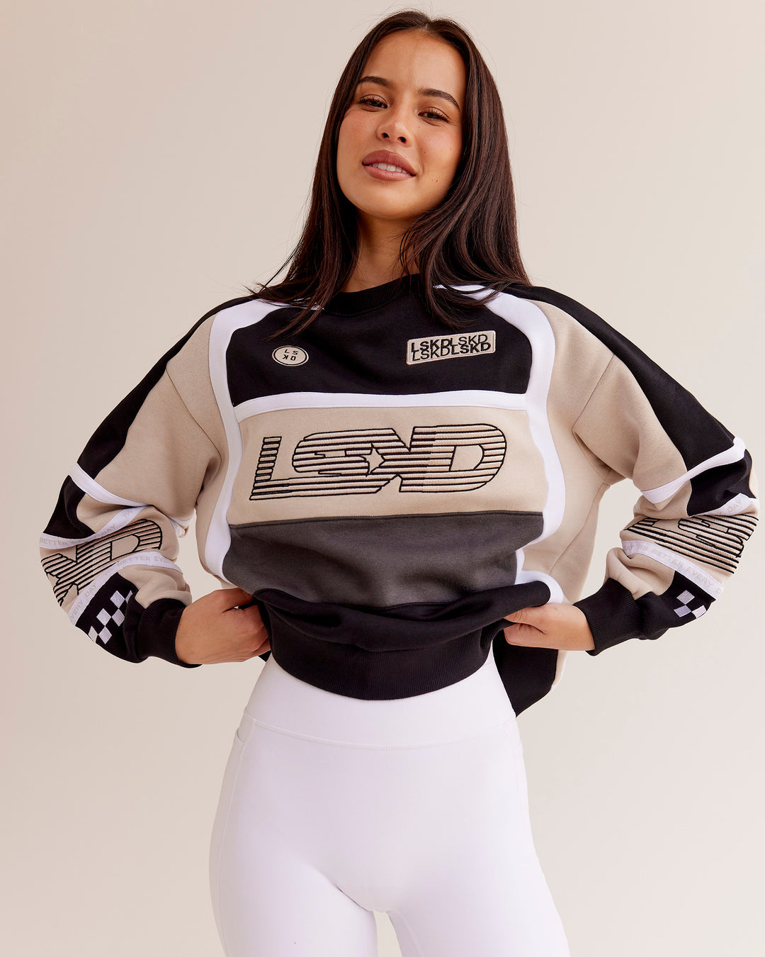 Woman wearing Power Sweater - Black-Shale Beige | Model:Eliza | Size:XS