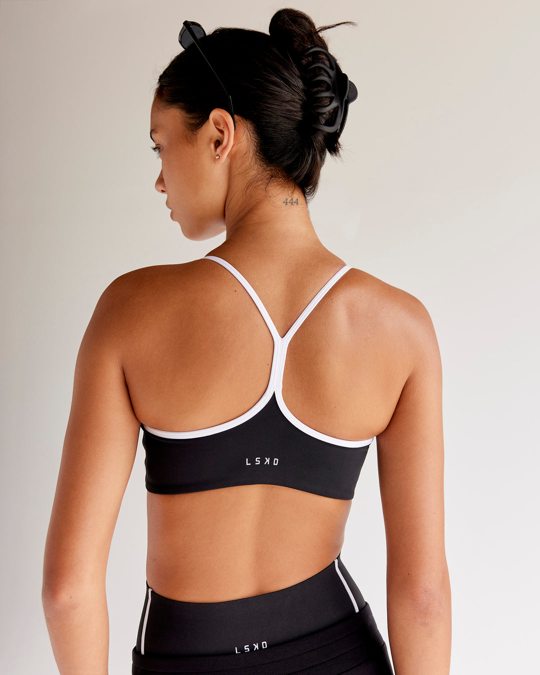 Woman wearing Power Sweetheart Sports Bra - Black | Model:Tali | Size:XS - view 2