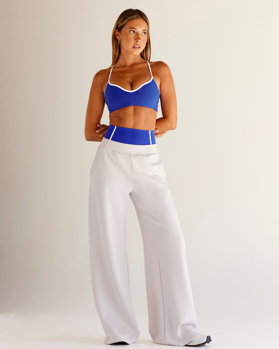 Woman wearing Power Sweetheart Sports Bra - Electric Indigo | Model:Charli | Size:XS