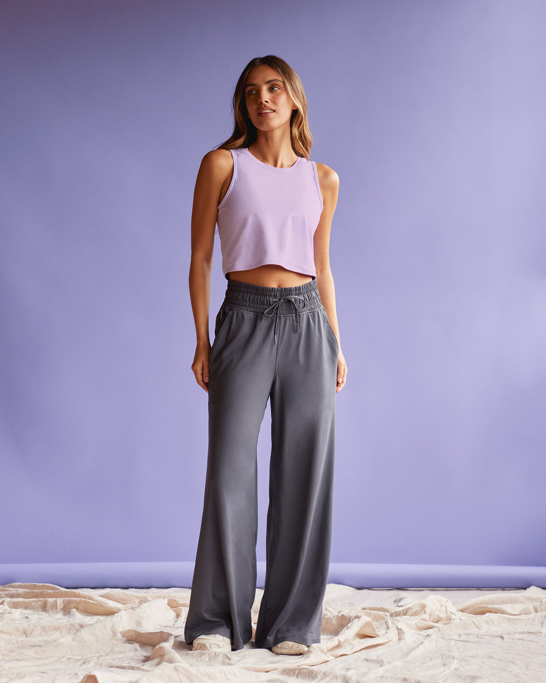 Woman wearing Restore CloudFLX Tank - Orchid Bloom Marl | Model:Beatriz | Size:XS