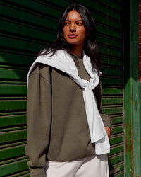 Woman wearing Shadow Mode Oversized Sweater - Walnut Grey | Model:Alex | Size:XS