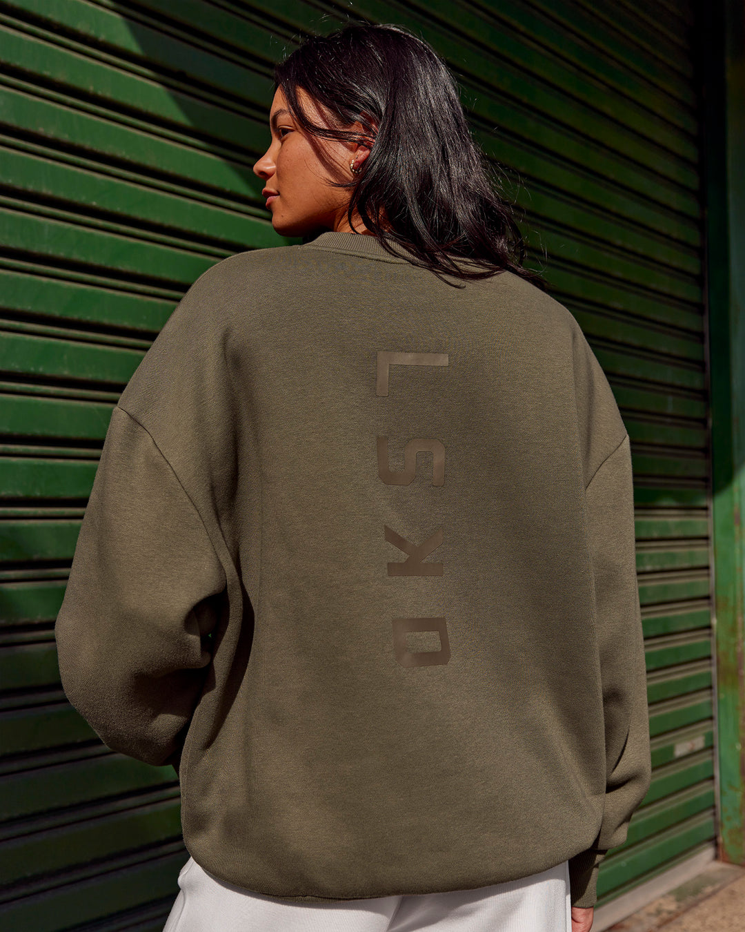 Woman wearing Shadow Mode Oversized Sweater - Walnut Grey | Model:Alex | Size:XS