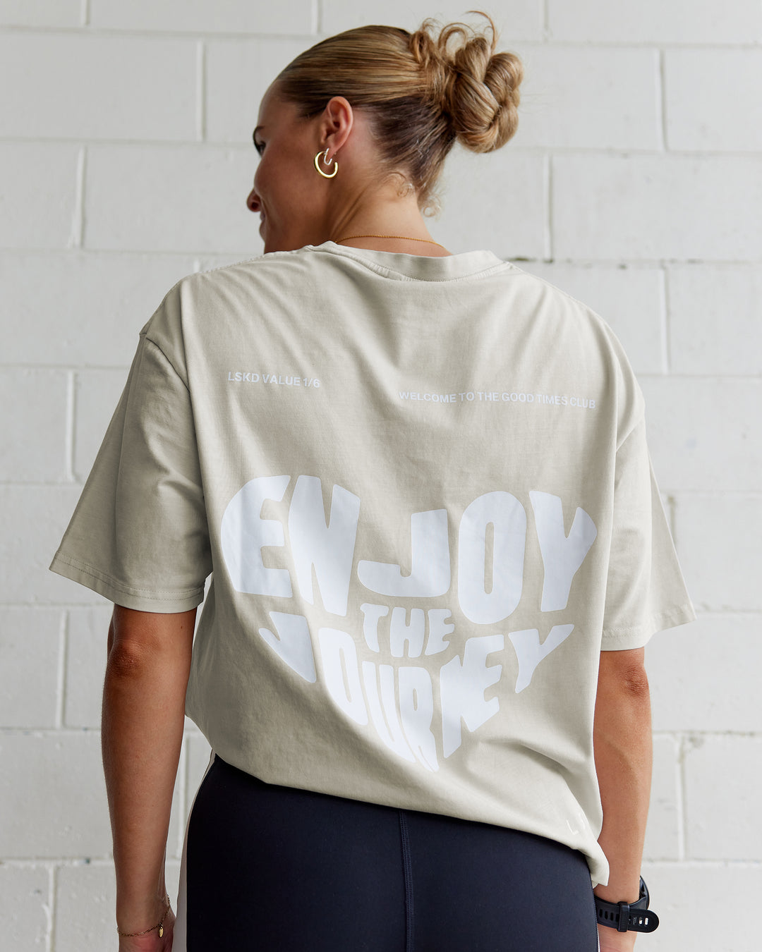 Woman wearing Heart FLXCotton Oversized Tee - Washed Shale Beige-White | Model:Shae | Size:XS
