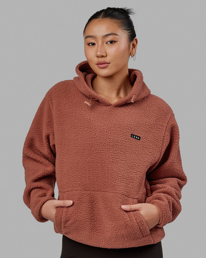 Woman wearing Unisex Alpine Hoodie - Cedar Wood