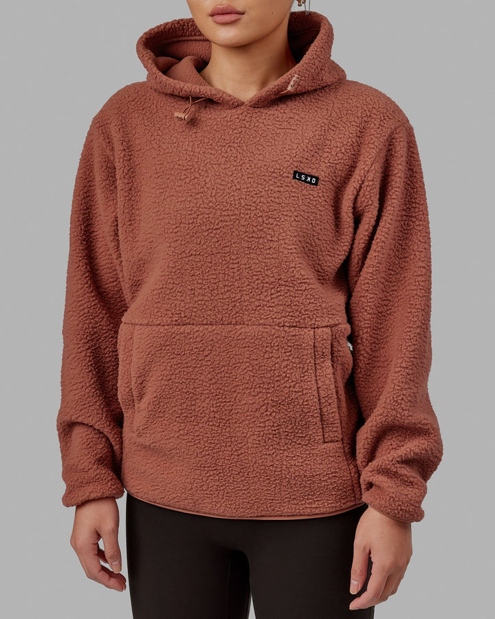 Woman wearing Unisex Alpine Hoodie - Cedar Wood
