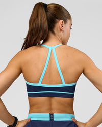 Woman wearing Breeze Sports Bra - Future Navy-Baltic Sea | Model:Grace | Size:XS