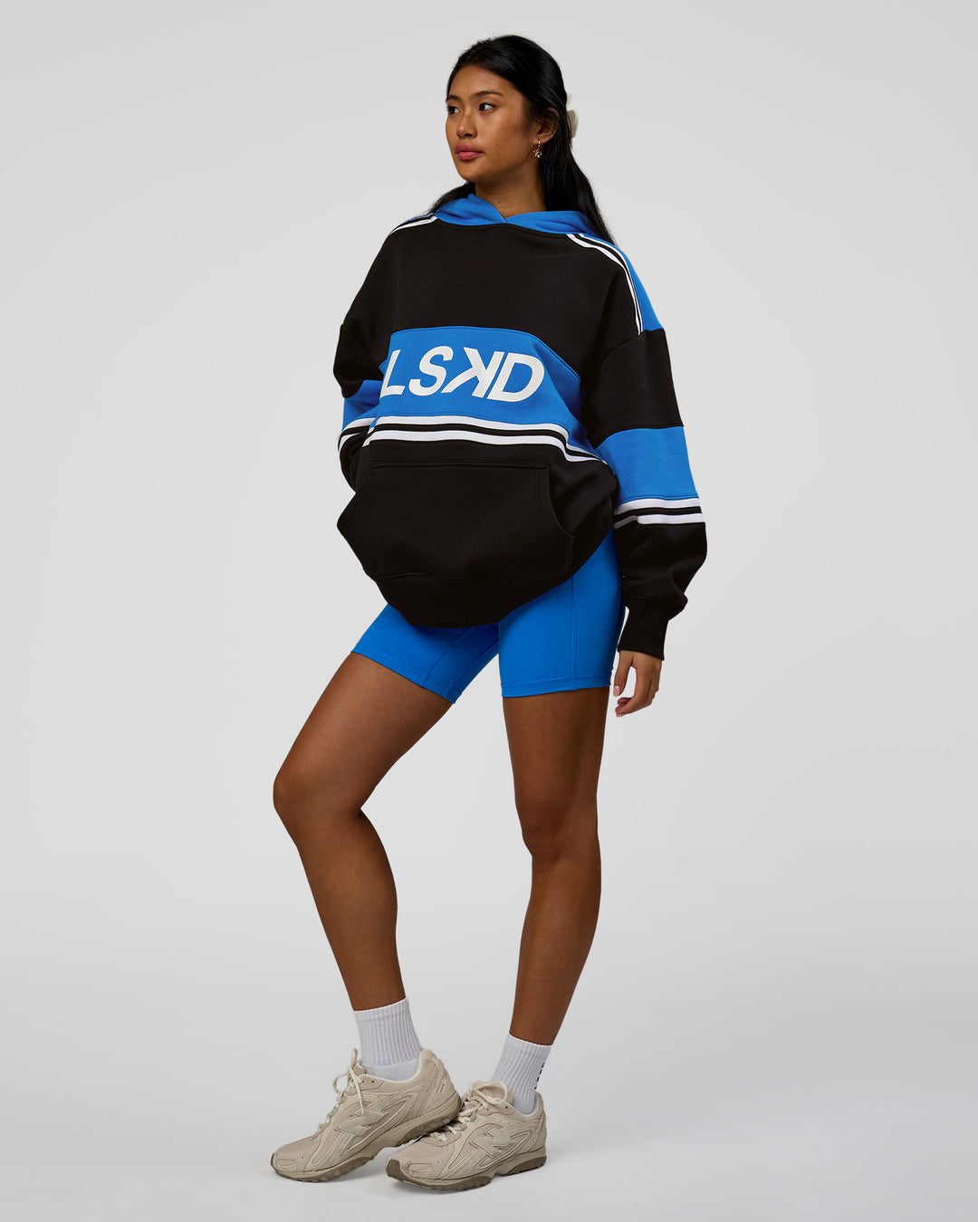 Woman wearing A-Team Oversized Hoodie - Caviar-Palace Blue | Model:Loren | Size:XS