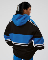 Woman wearing A-Team Oversized Hoodie - Caviar-Palace Blue | Model:Loren | Size:XS