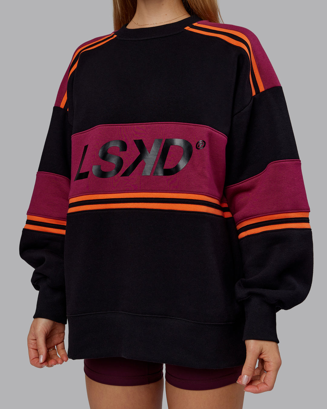Woman wearing A-Team Sweater Oversize - Black-Plum Berry | Model:Emilie | Size:XS