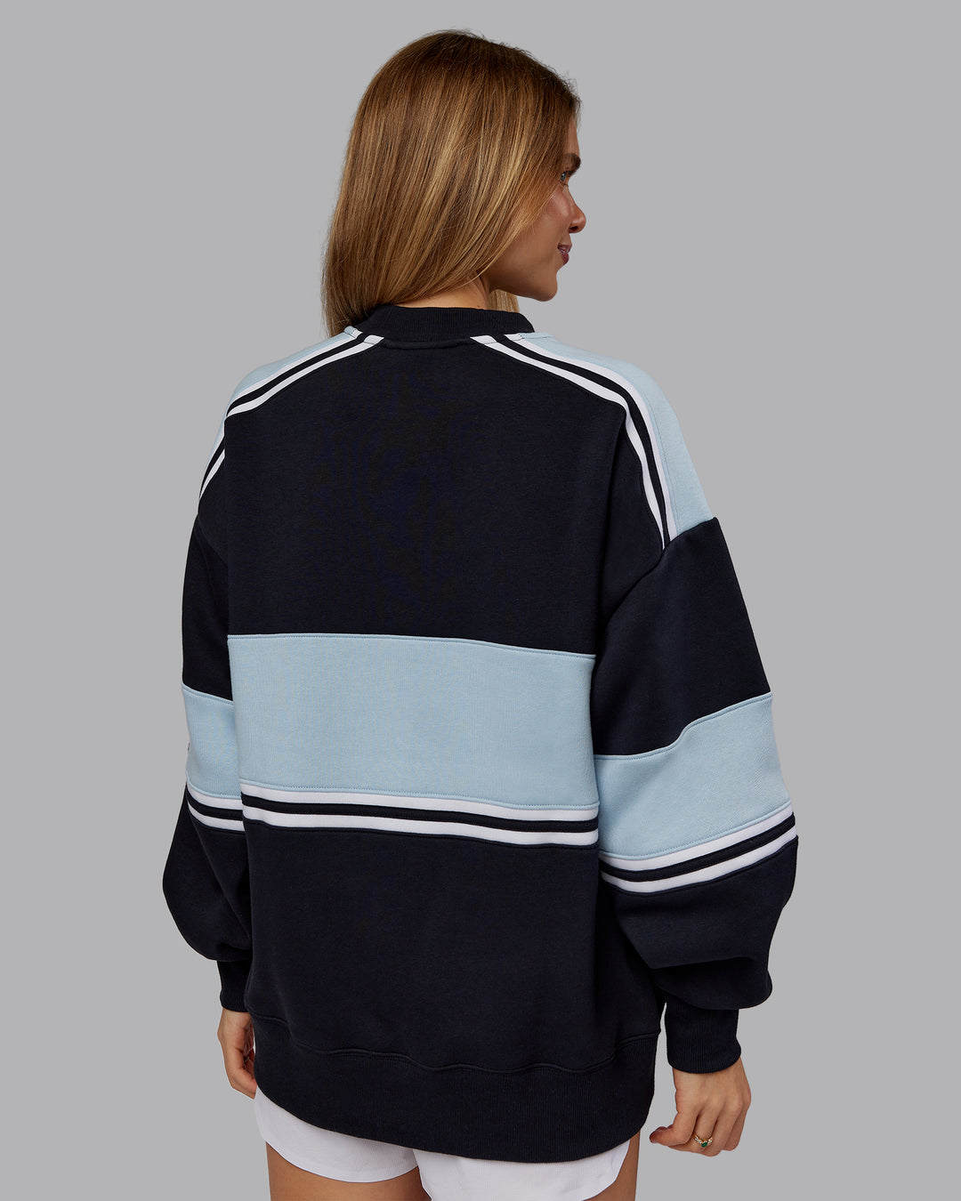 Woman wearing A-Team Sweater Oversize - Caviar-Skyride | Model:Emilie | Size:XS