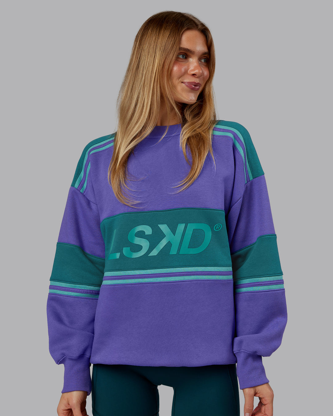 Woman wearing A-Team Sweater Oversize - Royal Purple-Multi | Model:Emilie | Size:XS