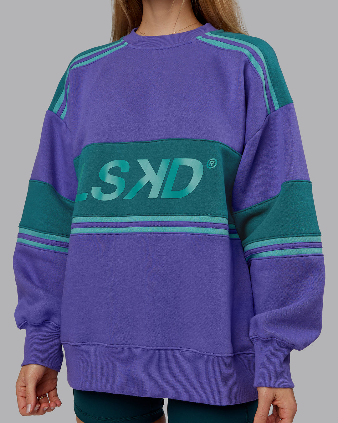 Woman wearing A-Team Sweater Oversize - Royal Purple-Multi | Model:Emilie | Size:XS