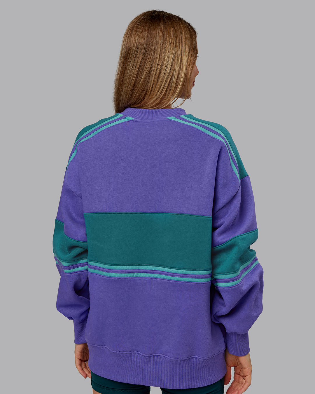 Woman wearing A-Team Sweater Oversize - Royal Purple-Multi | Model:Emilie | Size:XS