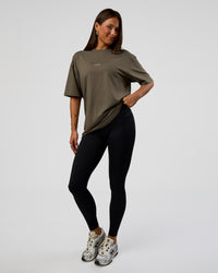 Woman wearing Abstract Haze FLXCotton Tee - Walnut Grey-White | Model:Bianca | Size:XS