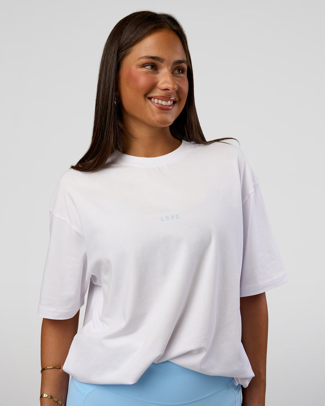 Woman wearing Abstract Haze FLXCotton Tee - White-Blue Aura | Model:Bianca | Size:XS