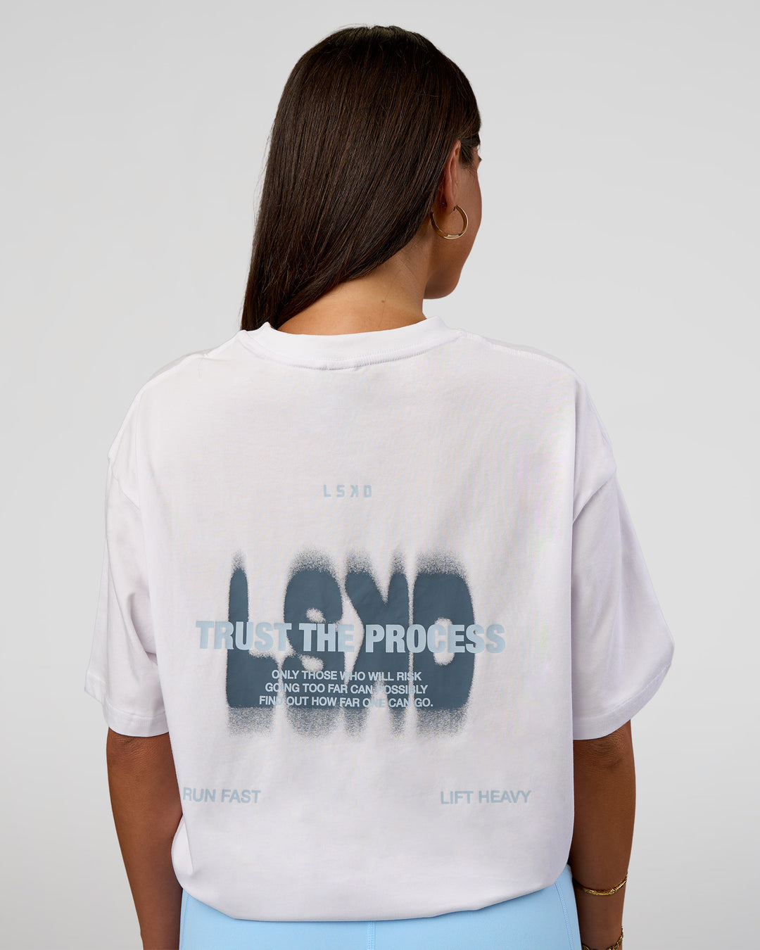 Woman wearing Abstract Haze FLXCotton Tee - White-Blue Aura | Model:Bianca | Size:XS