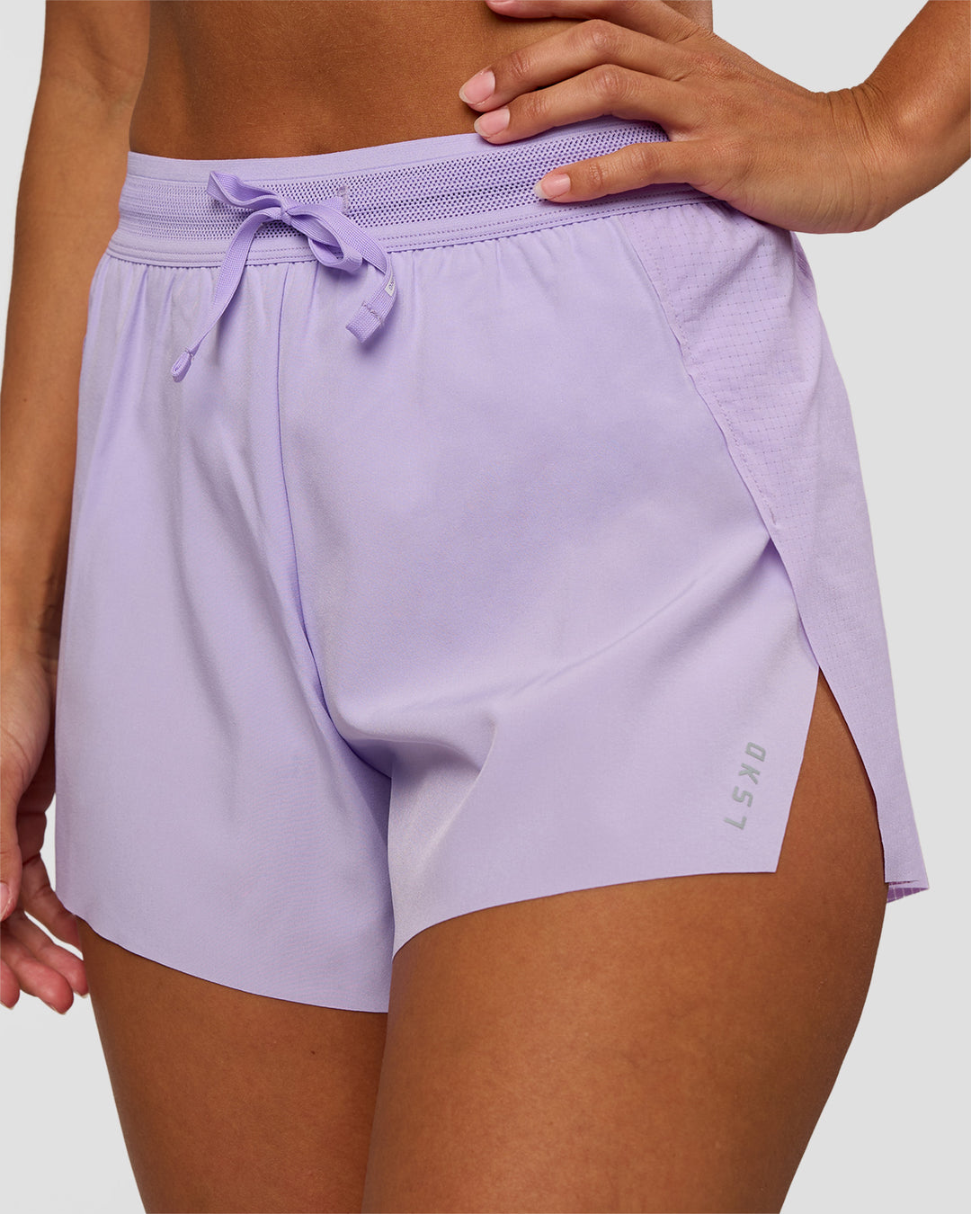 Woman wearing Accelerate 3" High-Rise Running Short - Pale Lilac | Set:true | Angle:closeup | Model:Brylee | Size:XS