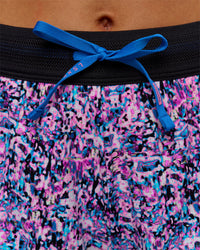 Woman wearing Accelerate 3" Mid-Rise Running Short in Energy Print Blue Multi | Model:Brylee | Size:XS