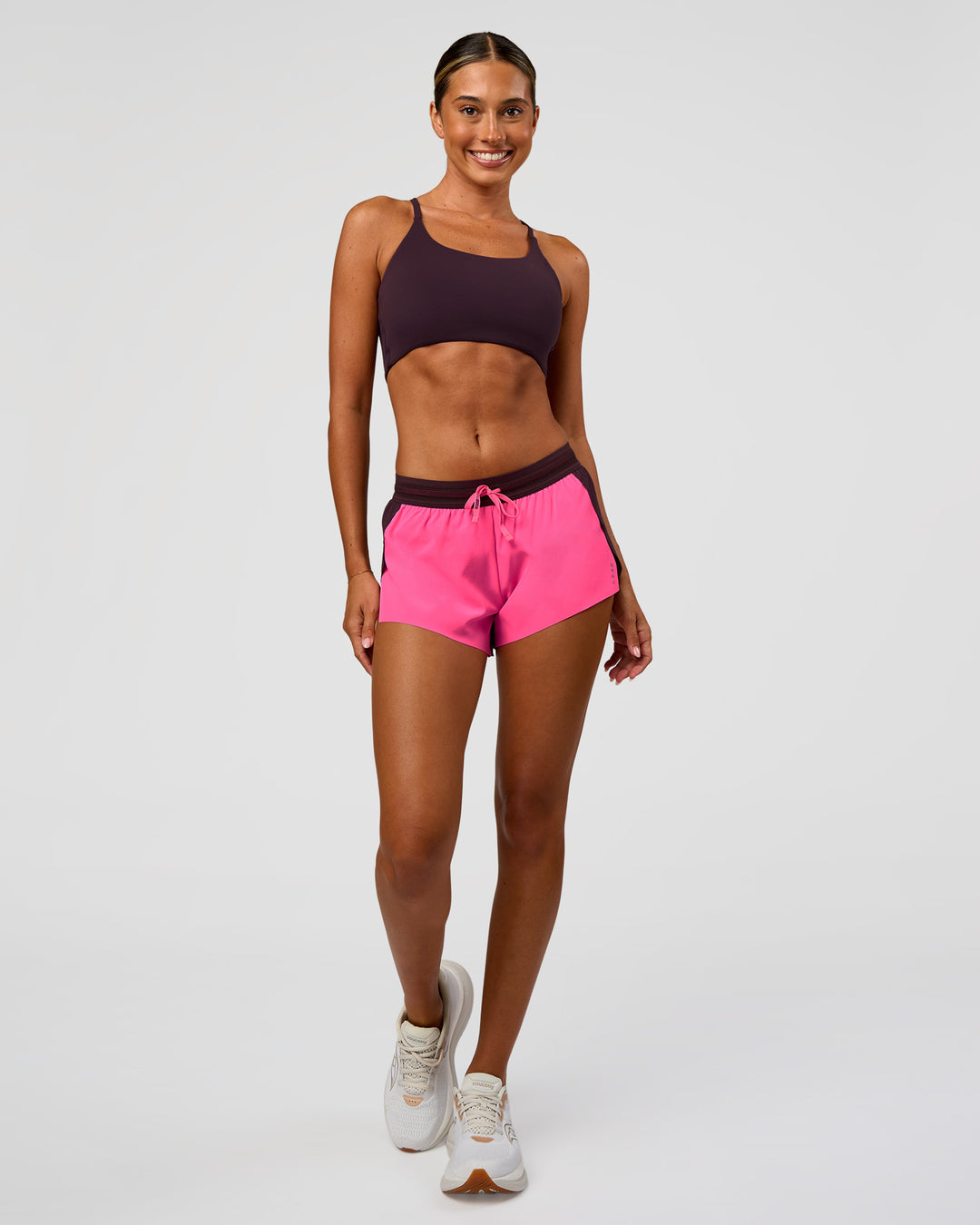 Woman wearing Accelerate 3" Mid-Rise Running Short - Midnight Plum-Sugar Plum | Model:Charli | Size:XS