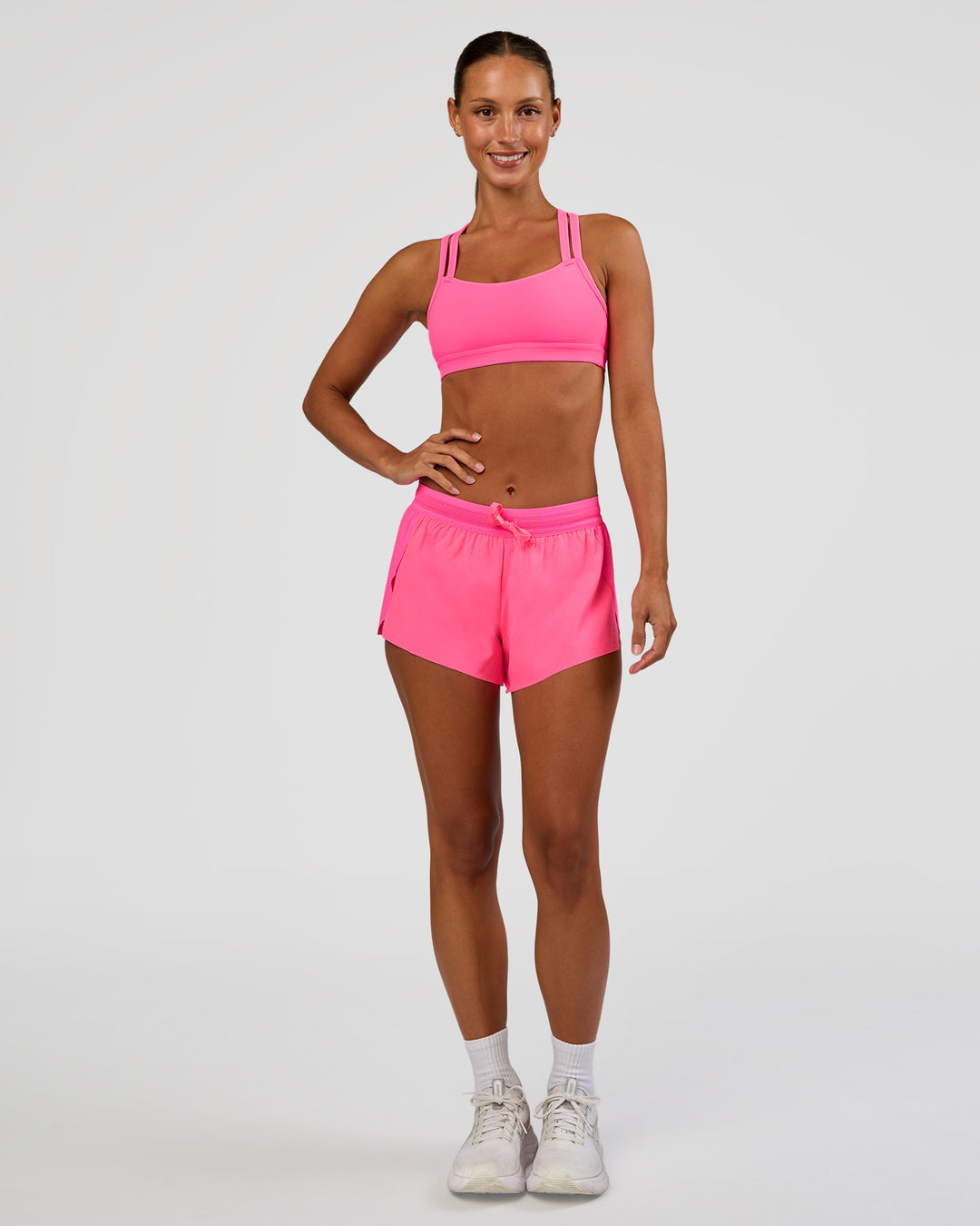 Woman wearing Accelerate 3" Mid-Rise Running Short - Sugar Plum | Model:Brylee | Size:XS