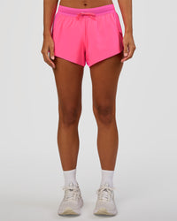 Woman wearing Accelerate 3" Mid-Rise Running Short - Sugar Plum | Set:true | Angle:front | Model:Brylee | Size:XS