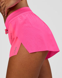 Woman wearing Accelerate 3" Mid-Rise Running Short - Sugar Plum | Model:Brylee | Size:XS