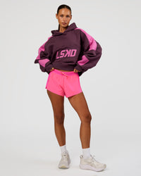 Woman wearing Accelerate 3" Mid-Rise Running Short - Sugar Plum | Model:Brylee | Size:XS