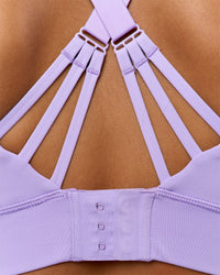 Woman wearing Accelerate Split Strap Sports Bra - Pale Lilac | Model:Brylee | Size:XS
