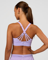 Woman wearing Accelerate Split Strap Sports Bra - Pale Lilac | Model:Brylee | Size:XS
