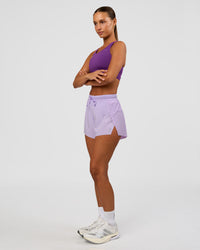 Woman wearing Accelerate Sports Bra - Fresh Purple | Model:Brylee | Size:XS
