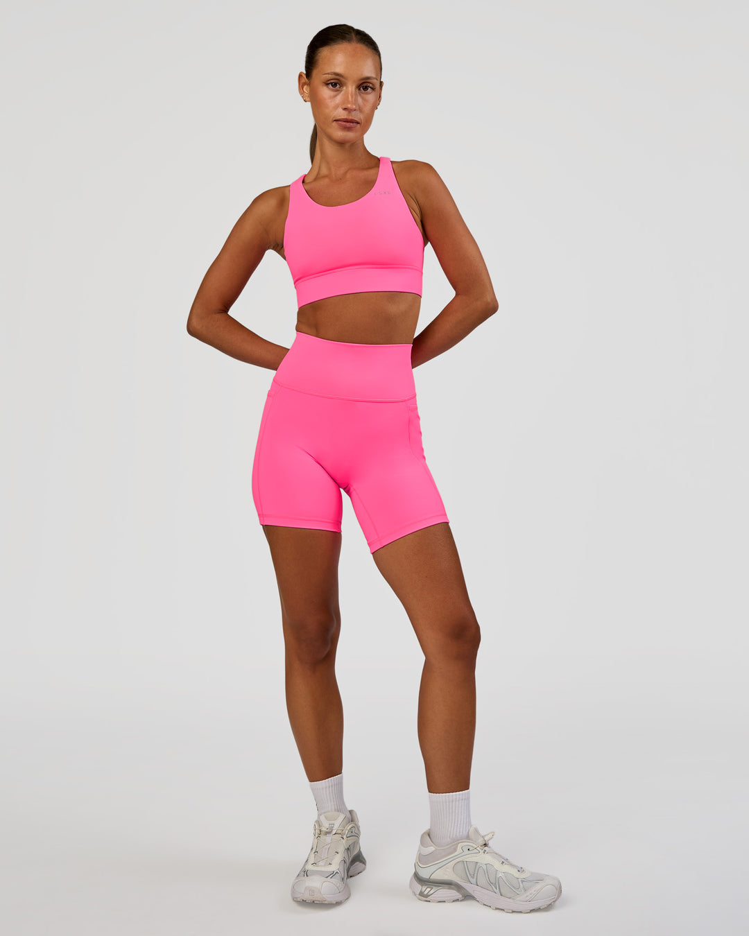 Woman wearing Accelerate Sports Bra - Sugar Plum | Model:Brylee | Size:XS