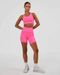 Woman wearing Accelerate Sports Bra - Sugar Plum | Model:Brylee | Size:XS