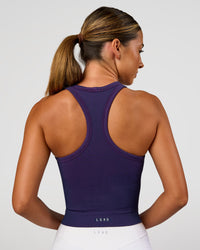 Woman wearing Activate Seamless Ribbed Shelf Bra Tank - Future Navy-Ultra Fuchsia | Model:Charli | Size:XS