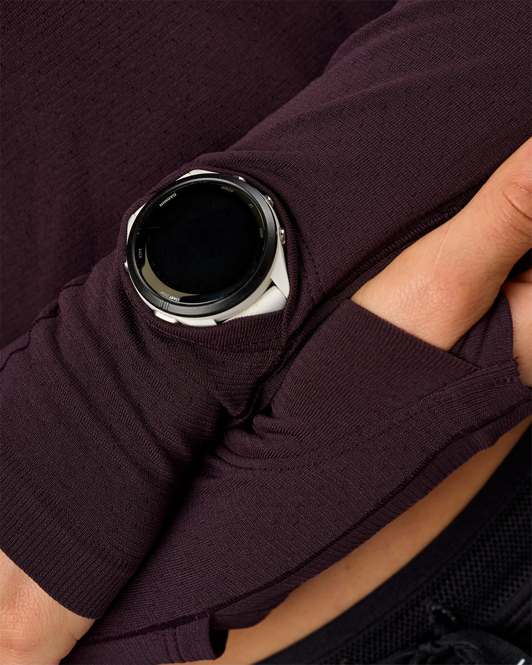 Woman wearing AeroFLX+ Long Sleeve Skimmer Half Zip - Midnight Plum/Midnight Plum | Model:Maja | Size:XS
