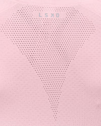 Woman wearing AeroFLX+ Seamless Long Sleeve Skimmer Tee - Marshmallow/Marshmallow | Model:Leilani | Size:XS