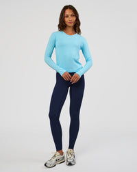 Woman wearing AeroFLX+ Seamless Long Sleeve Tee - Baltic Sea/Baltic Sea | Model:Dakota | Size:XS