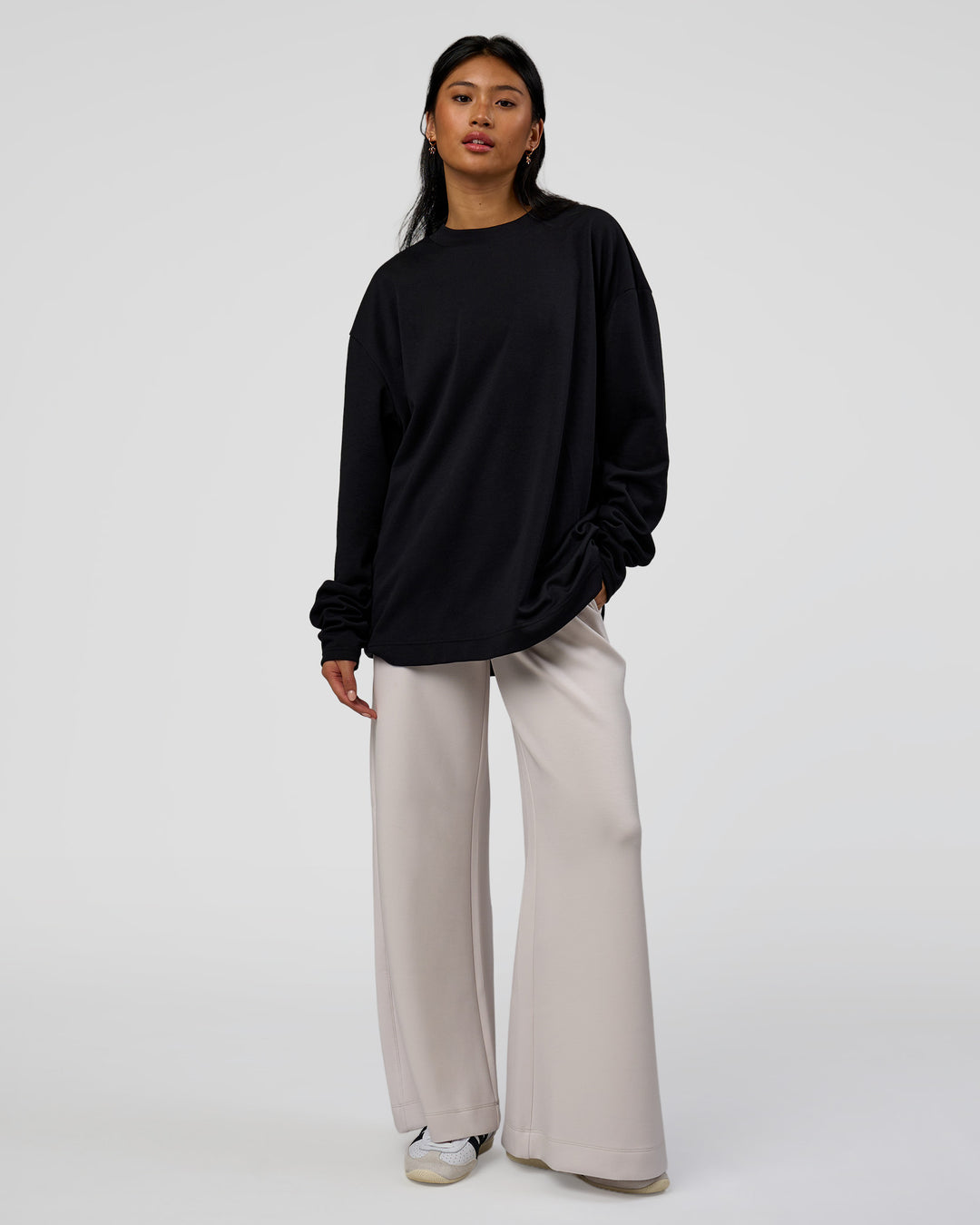 Woman wearing AfterDark ZeroCrease Long Sleeve Tee - Black | Model:Loren | Size:XS