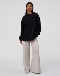 Woman wearing AfterDark ZeroCrease Long Sleeve Tee - Black | Model:Loren | Size:XS