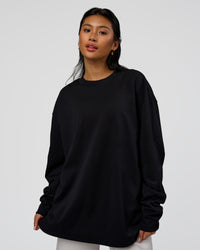 Woman wearing AfterDark ZeroCrease Long Sleeve Tee - Black | Model:Loren | Size:XS