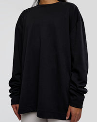 Woman wearing AfterDark ZeroCrease Long Sleeve Tee - Black | Model:Loren | Size:XS