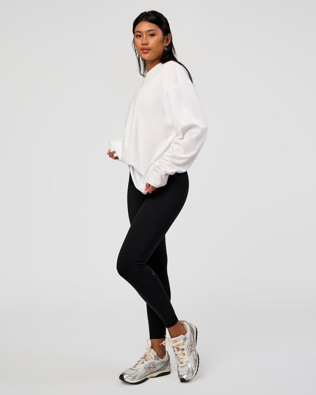 Woman wearing AfterDark ZeroCrease Long Sleeve Tee - White | Model:Loren | Size:XS