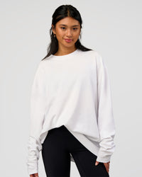 Woman wearing AfterDark ZeroCrease Long Sleeve Tee - White | Model:Loren | Size:XS