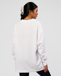 Woman wearing AfterDark ZeroCrease Long Sleeve Tee - White | Model:Loren | Size:XS