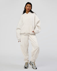 Woman wearing AfterDark ZeroCrease Oversized Hoodie - Silver Marl | Model:Loren |Size:XS