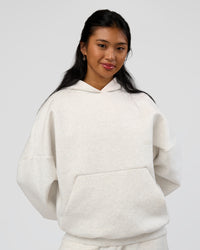 Woman wearing AfterDark ZeroCrease Oversized Hoodie - Silver Marl | Model:Loren |Size:XS