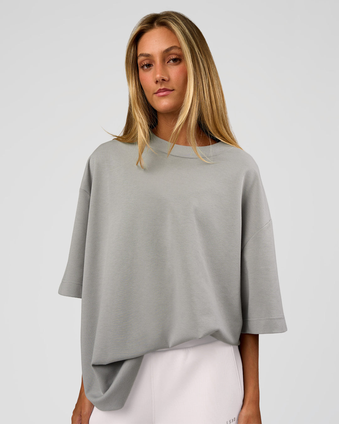 Woman wearing AfterDark ZeroCrease Oversized Tee - Alloy | Model:Georgia | Size:XS