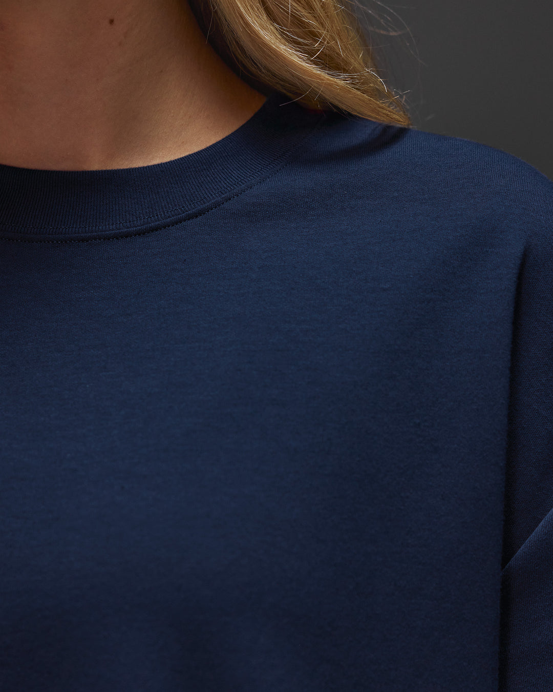 Woman wearing AfterDark ZeroCrease Oversized Tee - Future Navy | Model:Leilani | Size:XS